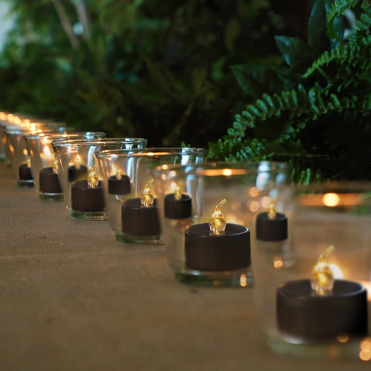 24 Pack Black Tea Lights Candles, Flickering Warm Yellow Flameless LED Tealights, Long Lasting Battery Operated Fake Candles, Decoration for Wedding, Halloween and Christmas