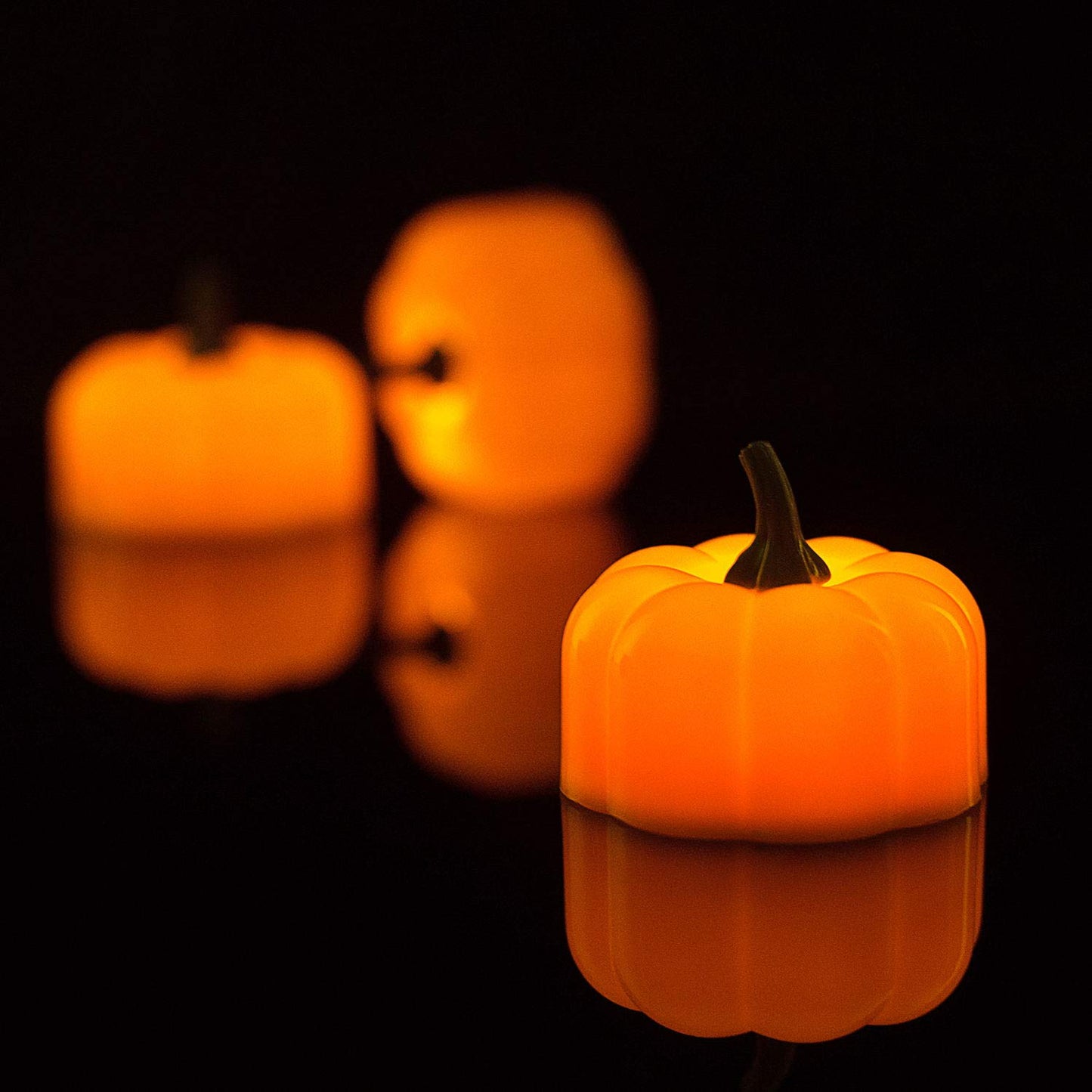 Halloween 12 Pack LED Pumpkin Lights, Jack-O'-Lantern, Small Orange Flickering Tea Lights, for Halloween, Fall Festival Decorations