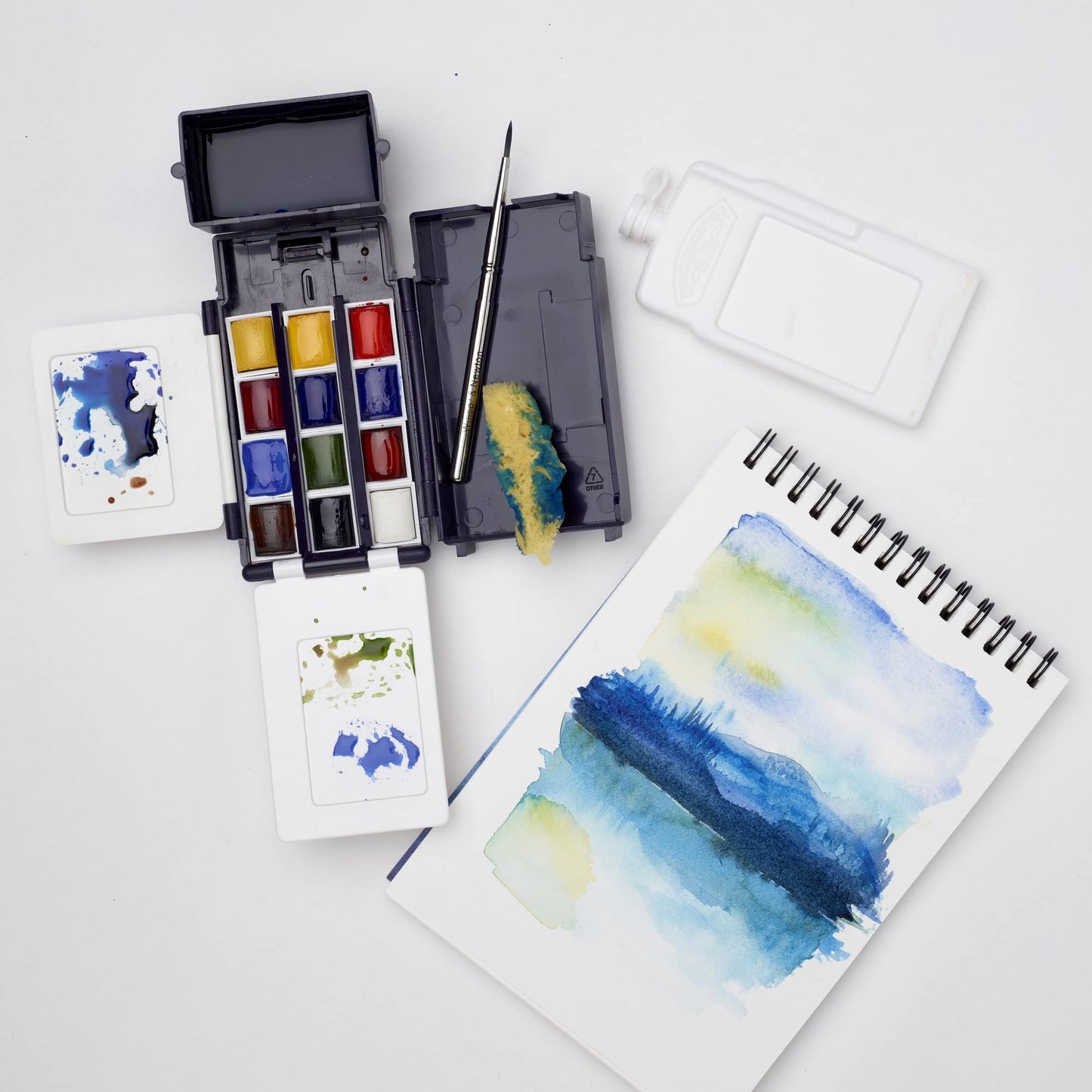 Cotman Watercolor Paint Set, Field Pocket Set, 12 Half Pan w/ Brush, Sponge, Bottle