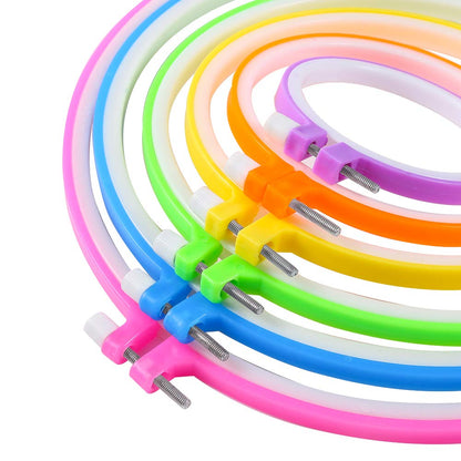 6 Pieces Embroidery Hoops and 15 Needles, Plastic Circle Cross Stitch Hoop Ring Embroidery Circle Set, 3.4 inch to 10.4 inch (Multicolor)